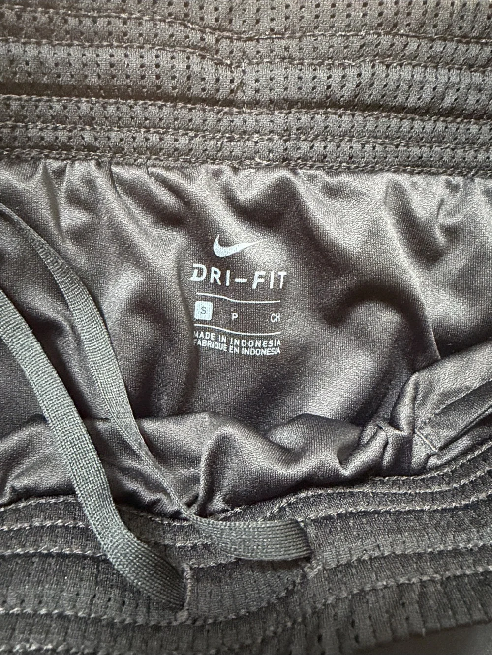 Nike Women's Black Shorts with Blue Side Panels